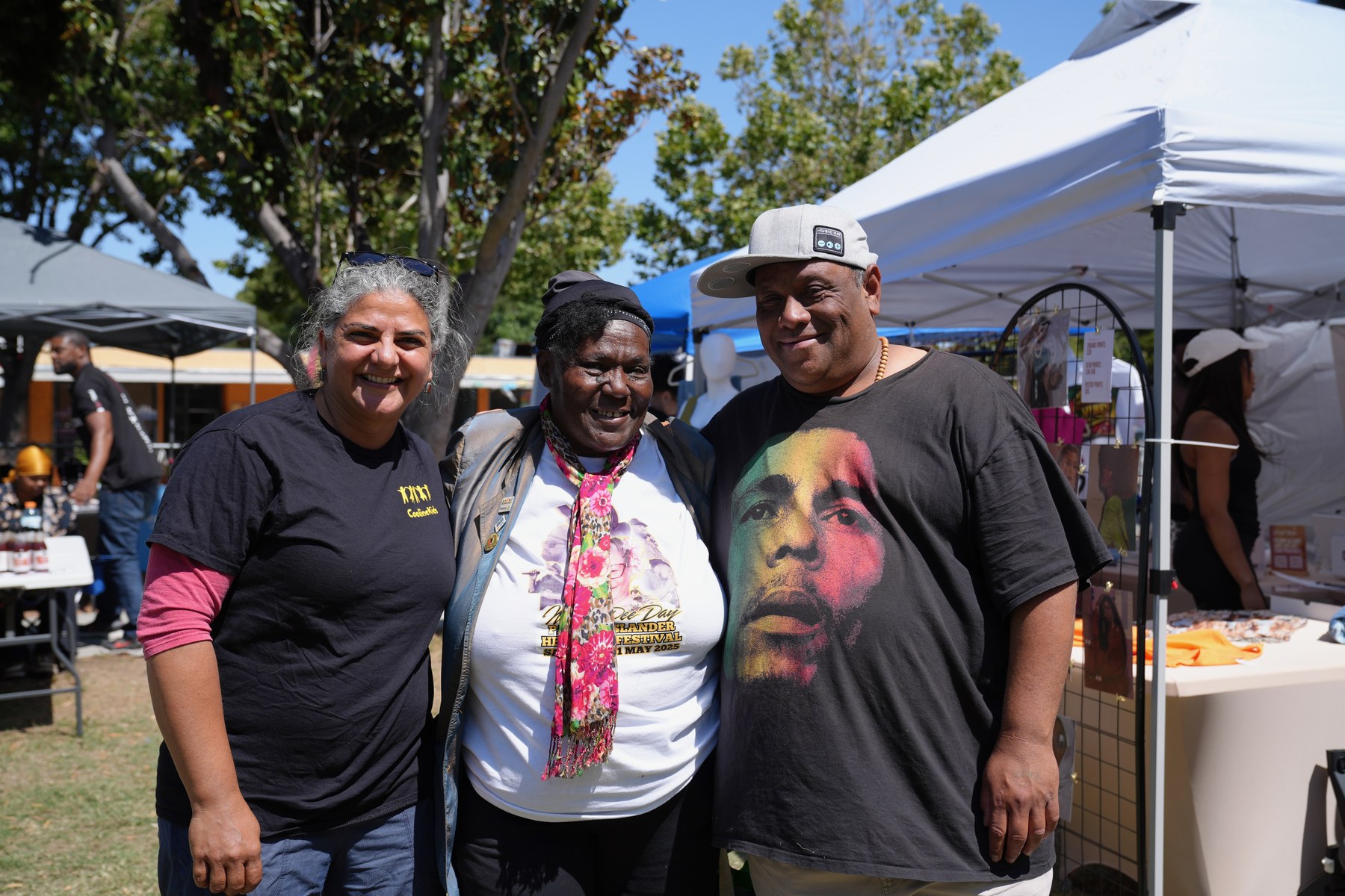 Volunteers and neighbors at a Heart to Heart outdoor event